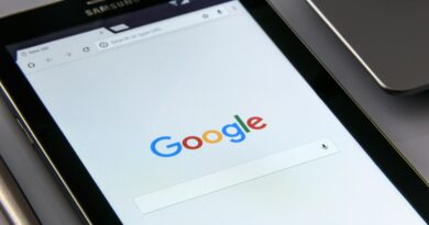 Close-up of a tablet displaying Google's search screen, emphasizing technology and internet browsing.