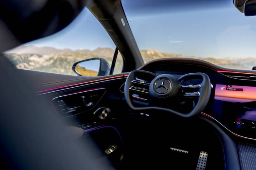 Mercedes EQS steer-by-wire option with a flat steering wheel and rear-axle steering in the electric luxury sedan