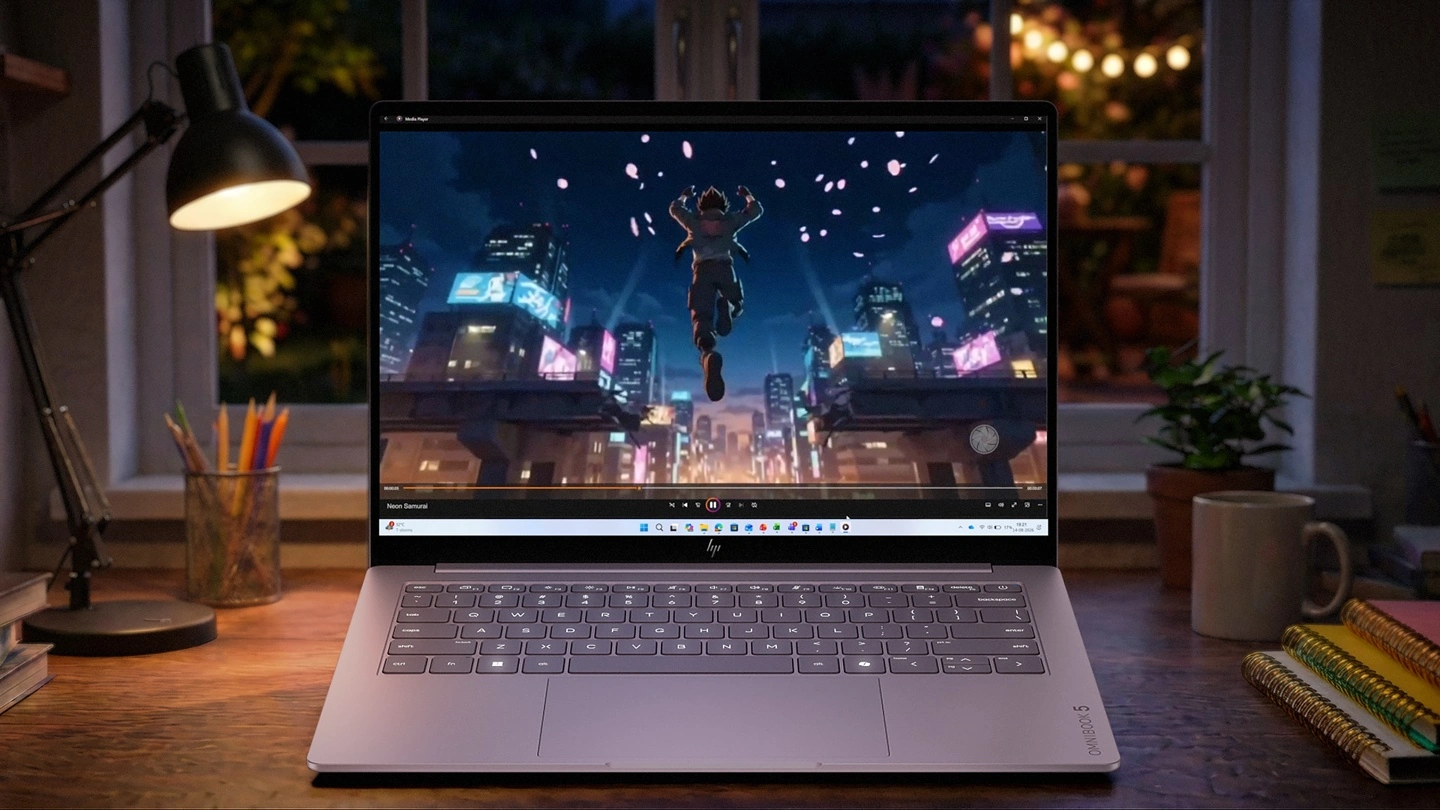 HP OmniBook 5 14 and ProBook 4 G2iS 14 laptops displaying vibrant screens
